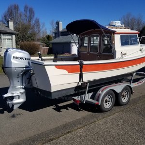 Here she is with a brand new Honda 90hp