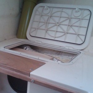 port access hatch w.sub woofer cabinet and air conditioning duct