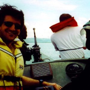 Underway again after a little toothbush repair.  Lake Kivu, Central Africa, 2001