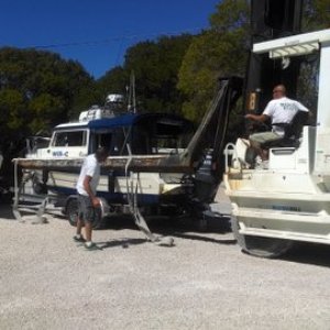 Pilot House Marina lifting Will-C off the trailer in Key Largo