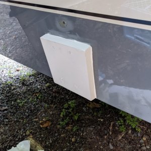 3/4\" Starboard mount for new transducer. Screws go into epoxy blobs in transom