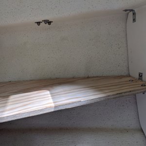 Port-side cuddy shelf. Attached to front (flotation) bulkhead, and cabin bulkhead