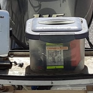 stern fishing work area with sonar, mini-storage, and temp/speed display on the right