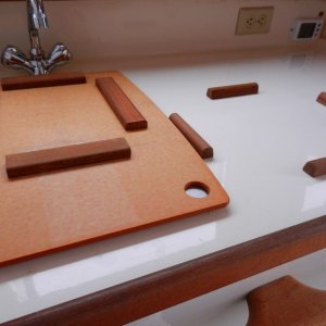 Cleats glued to galley counter and back of cutting board.