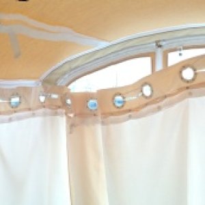 Panoramic of our new arrangement.  We use clips to attach the rope to the hand rails, and a boat hook as a center pole.  This makes deployment rapid.