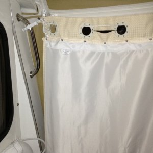 Starboard view: rope, clip and curtain in place.