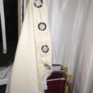 Starboard view: detaching the clip from the handle is swift allowing for easy access without disturbing the set-up.  This has made our lives so much easier.