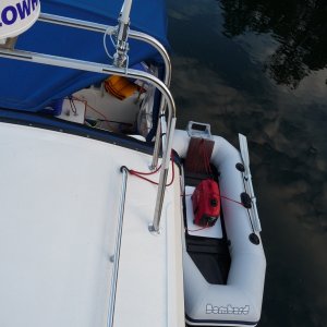 Media '3. The generator is quite quiet. Putting the generator in the dingy get's rid of any vibration it could produce if sitting anywhere on Pacific Wanderer.' in album '1. I put this 1/4" sheet of plastic down to protect the bottom of the boat while the generator is running and give a more stable base for the 1000 watt Honda Generator to sit on and also protect the bottom of the boat.'