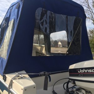 Rear window panel installed and can be rolled up.