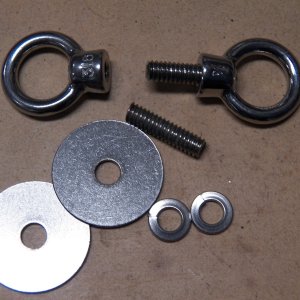 I found these stainless lift eyes on Amazon for $2 each.  When I tried to order more, the price had gone to $3.  I cut 1/4" stainless threaded rod to make the tie-down points that I wanted.