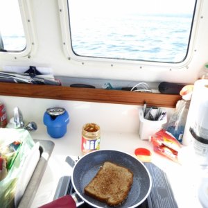 Making breakfast while waiting for waves to die in the Strait