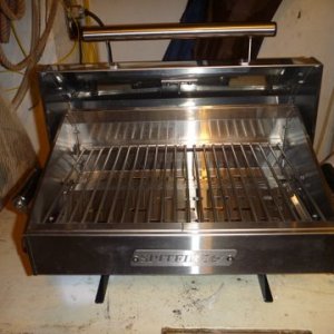 It will never be this clean again. I broke down and ordered a rod holder type mount for this puppy. As the economy gets worse we hope to live off road kill. (sic)