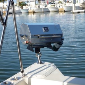 Cooked a couple New York strips steak tonight in Key West City Marina, this thing works like a champ,eatin good in the neighborhood. Charter boat row in the back round.
