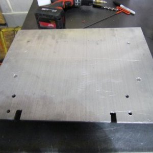 counter sunk allen headed stainless 10 /32 screws secure the aluminum uprights to the plate