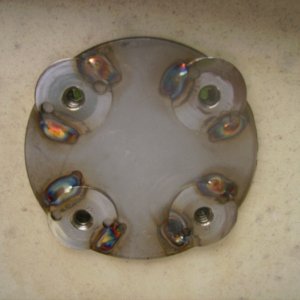 Backing plate to be mounted under floorboards.  I drilled holes to accomodate stainless tee nuts and welded to underside of backer plate.