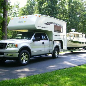 Another shot of Ford F150 4x4 with Northstar Freedom Truck camper, specifically designed for the 1/2 ton truck.  Camper has AC, Queen bed, two burner stove, hot water heater, cassette toilet, shower, dinette, sink, portable microwave (can be used on the boat) and Honda 2000 generator.  All the comforts of home.