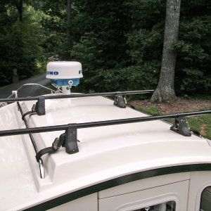 This is a gutter mount Yakima rack that I had hidden in the garage.  It came off an old Isuzu Trooper.  The main bracket has padded rubber on the bottom and the metal brace is mar free as well.  Snug secure fit.