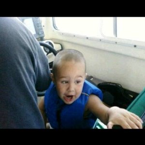 Grandson Anthony at the helm