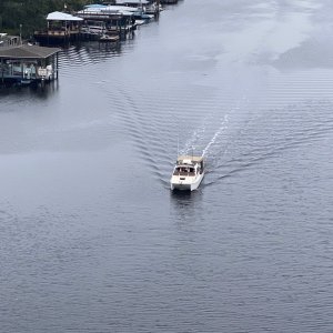 She got this pic of me coming to boat ramp from the top of the 65' bridge. Currently anchored for the night at another kayak launch at the Atlantic Beach park. Tomorrow we hit Blue Days old stopping ground, Jacksonville.