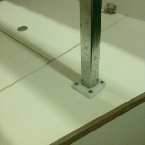 Table leg support (keeps leg from getting pushed out of factory support hole).