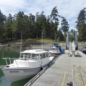 Media 'Big-C at the dock with Ari on Monday morning' in album 'Departing Friday Harbor Sunday morning. At this speed it took 1.5 hours to get to Jones Island'