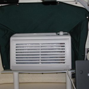 TomCat air conditioner, and Sunbrella shroud.