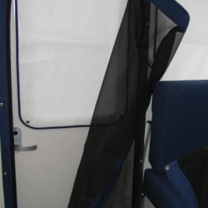 Door with snap on curtain and snap on screen door that zips to open and close.