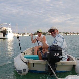 Our new found sailing friends Mike & Bev giving us a dingy to dingy tow...we had oars...they had a motor.