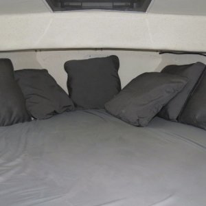 Berth with memory pad and sheets for sleeping.  Additional photos follow.