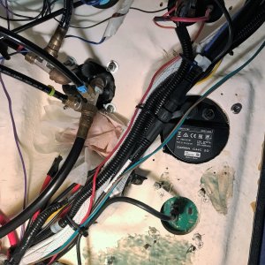 Back of new control head installed in dash. (Back of Steering wheel has old auto pilot lines.)