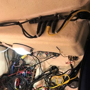 Main network T mounted in Vberth above back of helm.
