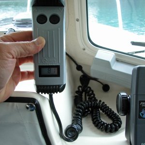 (AnchortownJim) Windless control in my hand.  The cord is long enough when passed through the open front window for me to operate it from the bow.  It also has a built in line out counter.  Very handy to know how much rode is out.