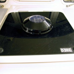 (AnchortownJim) Nicro Vent 2000 Day/Night mounted in the hatch.