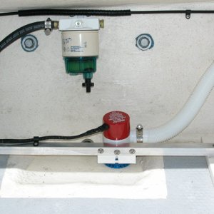 Media 'Aft bilge pump mounting' in album '(AnchortownJim) Quick ASTER 500 mounting plate made out of 3/16" 6061 aluminum, prior to being epoxied to the deck with MarineTex, side view.'