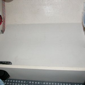 Level floor in galley cabinet.  Made out of 1/2" ply and screwed to cleats for easy removal.
