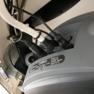 Media 'C80 rear view. Note the partially hidden long brass lower mounting screw to Alpha Numeric Keypad and 'L' mounting bracket on the far side of the C80.' in album 'Raymarine Alpha Numeric Keypad monuted to original support bracket.'