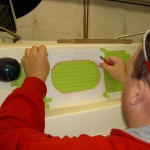 Making a template and positioning.  Masking tape to prevent gel coat chipping.