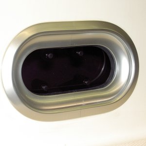 Insert porhole after caulking and secure from inside.