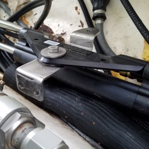 Baystar ram bracket bolted to steering prior to installing on outboard frame.