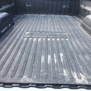 Mat between truckcamper & truck bed for bed & camper protection & to keep camper from moving in bed with normal tie downs