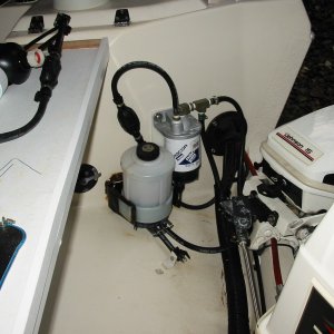 Inlet on right,outlet on left(w/short hose and coupler)