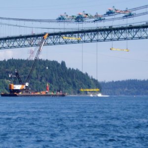 Gantry cranes set to raise first road section