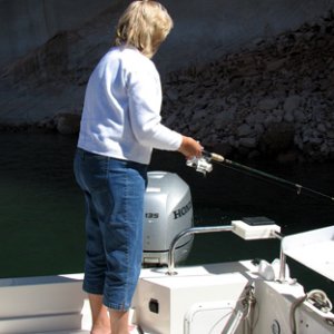 Joan fishing on the Escalante River