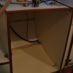 Media 'Project #4, Installing a Tundra refrigerator in this under-helm location.' in album 'The hanging locker that wasn't tall enough to hang clothes in.'