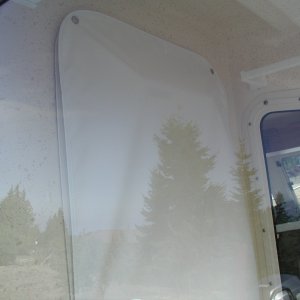 Shower Curtain..Factory fix for the leaky warped shower door. Works for me!