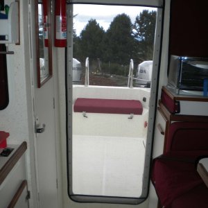 Media 'Screen door for rear. Screen reinforced with Sunbrella.' in album 'Latest offering from the Dreamer Canvas Shop. Way to go Janet! Covers for all windows!'