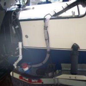 Media 'From Left to Right Overflow for Baitwell, Rule Baitwell Pump and Si-Tex Transom Mount Transducer' in album '2006 19' C-Dory'