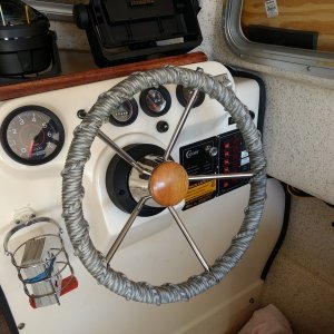 Then I pulled this destroyer wheel from the fishing boat, wrapped it with some 550 Paracord, and installed it in the Dory. Nice little update from the "vintage" plastic wheel.