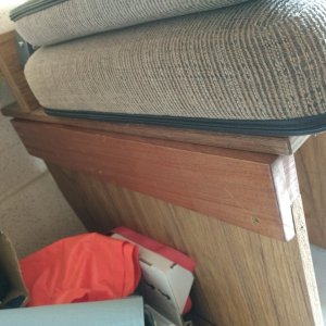 Seat riser raises the seat 2.5 inches. Dual purpose making more room for the fridge and letting me get rid of the throw cushion I normally sit on while driving.