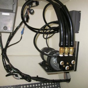 Hydraulic lines and wires connected.